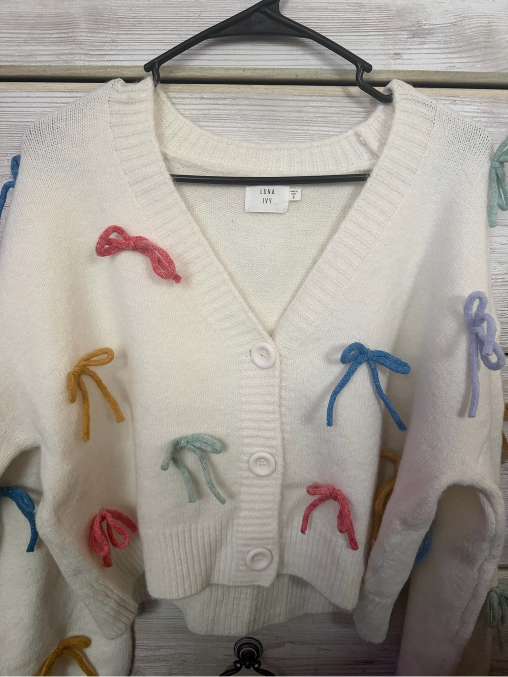 Luna Ivy Cream Bow-Appliqué V-Neck Cardigan Sweater